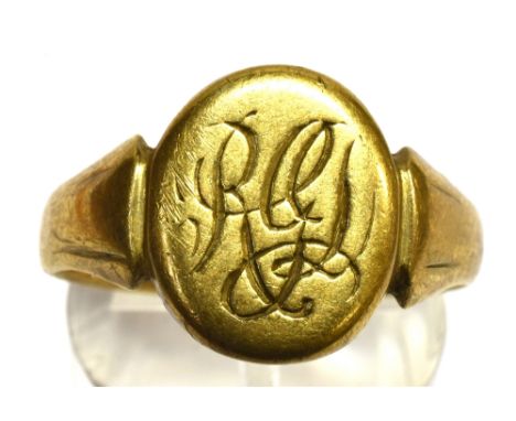 A GENTS 9CT GOLD SIGNET RING the oval head with monogrammed initials, ring size S, weighing approx. 4.4 grams Condition Repor