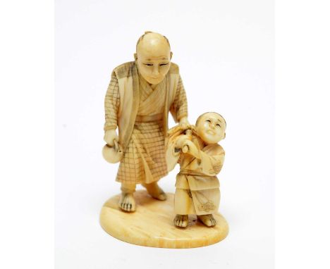 A small Japanese ivory okimono, Meiji period, carved as a man holding a tea kettle and a small boy with bundle, signed, 7cms.