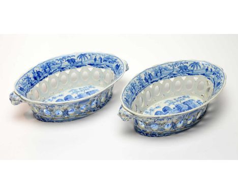 A pair of Spode pearlware blue and white Cacamanian series chestnut baskets, each printed with Sarcophagi at Cacamo within a 