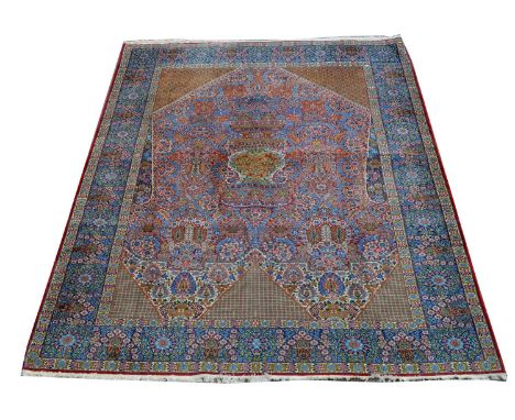 Rare Tehran carpet, the shield shaped field with floral and flower head design, 300 x 247cms.