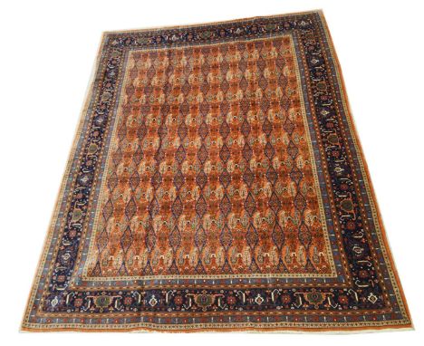 A Tabriz carpet, with repeated boteh decoration, 305 x 216cms.