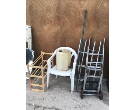 A METAL FOLDING SACK TRUCK, FOUR SECTION TWELVE RUNG LADDER, CHAIR, RAKE ETC 