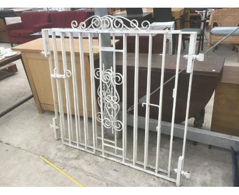 A PAIR OF ORNATE WROUGHT IRON GATES (EACH GATE 120CM X 119CM TO HIGHEST POINT) 