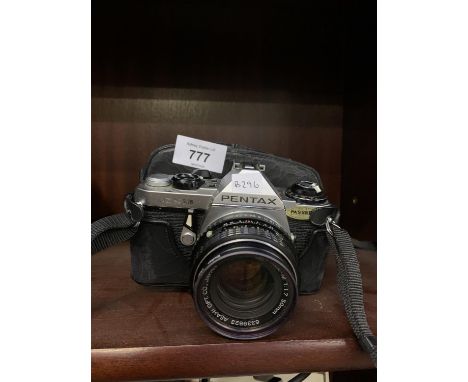 A PENTAX ME SUPER VINTAGE STYLE CAMERA AND CASE 