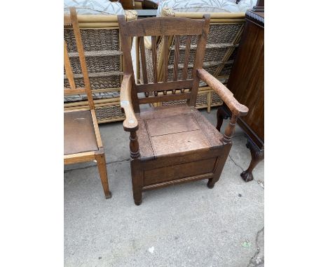 AN OAK COMMODE 