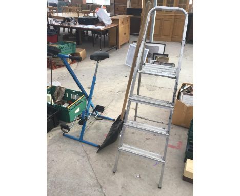 A PAIR OF ALUMINIUM FOUR RUNG STEP LADDERS, A NEW SNOW SHOVEL AND AN EXERCISE BIKE 