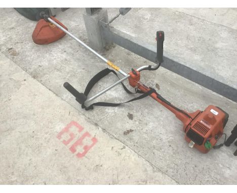 A HUSQVARNA 232R PETROL STRIMMER (ENGINE RUNS BUT NEEDS ATTENTION TO PULL CORD) 