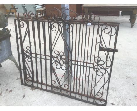 A PAIR OF ORNATE WROUGHT IRON GATES EACH GATE 128CM X 112CM TO HIGHEST POINT 