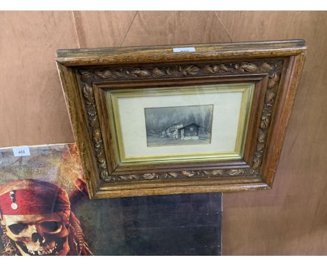 A PRINT IN A CARVED OAK DECORATIVE FRAME 