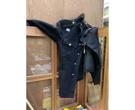 A NAVY BLUE ARMY JACKET TOGETHER WITH TROUSERS 