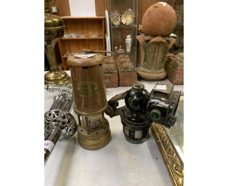A 'LAMP &amp; LIMELICH' COPPER AND BRASS MINERS LAMP TOGETHER WITH A VINTAGE 'JOSEPH LUCAS' BIKE LIGHT 