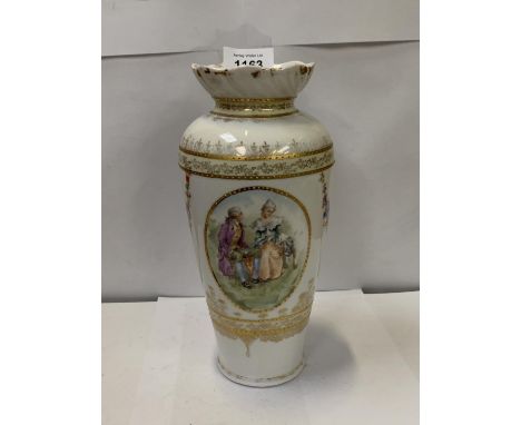 A CONTINENTAL HAND PAINTED PORCELAIN VASE 