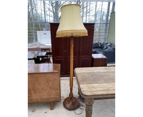 AN OAK STANDARD LAMP 