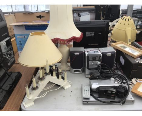 A TECHNIKA MINI HIFI WITH SPEAKERS,CAMERA, DVD PLAYER, TWO LAMPS AND A CHRISTMAS LAMP IN WORKING ORDER 