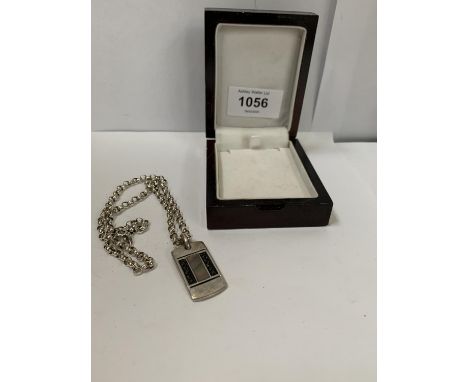 A SILVER ROLLER BALL CHAIN WITH SILVER RECTANGULAR PENDANT 