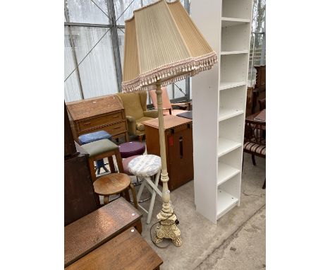 AN ORNATE RESIN STANDARD LAMP 