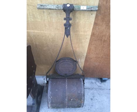 A VINTAGE GARDEN ROLLER 