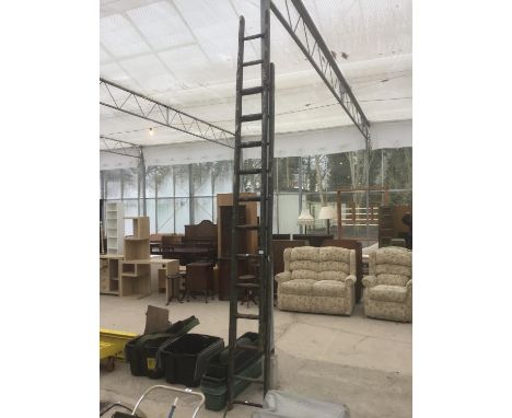 A VINTAGE TWENTY FOUR RUNG TWO SECTION WOODEN LADDER AND A QUANTITY OF PLASTIC GARDEN TROUGHS 