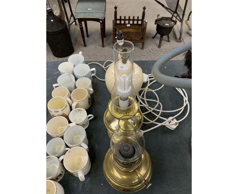 TWO CERAMIC LAMP BASES TOGETHER WITH TWO BRASS OIL LAMPS AND TWO GLASS FUNNELS 