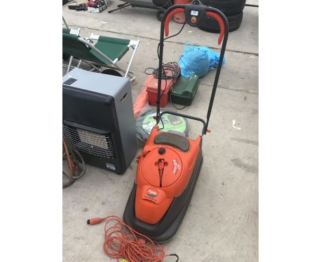 A FLYMO VISION COMPACT 330 EASI REEL ELECTRIC LAWNMOWER 