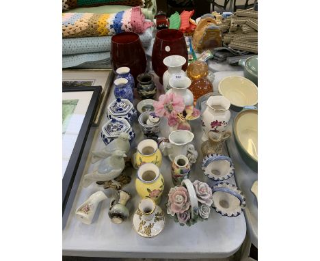 A COLLECTION OF ASSORTED CERAMIC VASES AND GLASS PAPER WEIGHTS 