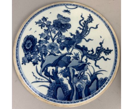 A CHINESE BLUE AND WHITE CERAMIC PLAQUE, 26cm D