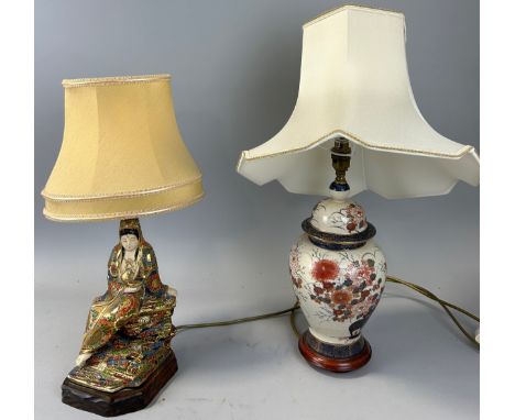 A JAPANESE CERAMIC LAMP IN THE FORM OF A LADY ALONG WITH ANOTHER JAPANESE CERAMIC LAMP,