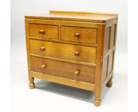 A ROBERT THOMPSON OF KILBURN "MOUSEMAN" OAK CHEST, of two short and two long drawers, with turned wood handles, panel sides, 