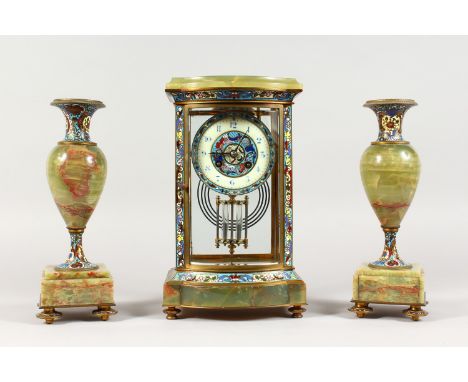 A GOOD FRENCH CHAMPLEVE ENAMEL AND ONYX THREE PIECE CLOCK GARNITURE. Clock: 12ins high.  Side Pieces: 11ins high.