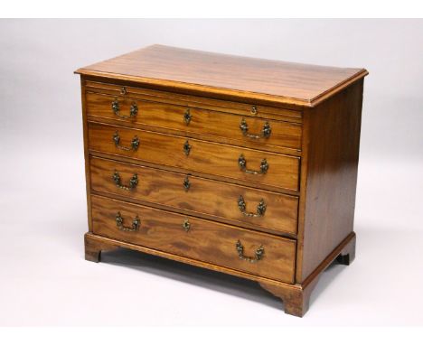 A GEORGE III MAHOGANY STRAIGHT FRONT CHEST OF FOUR LONG GRADUATED DRAWERS, with brushing slide and brass handle, and supporte