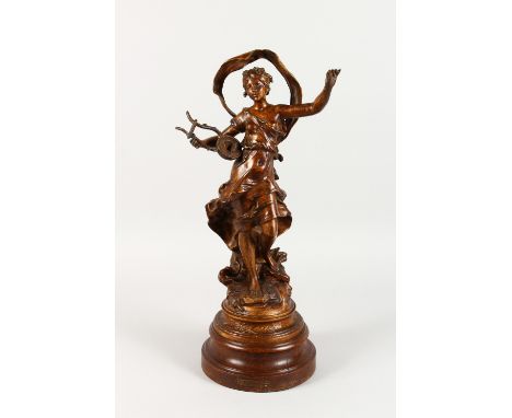 AFTER AUGUSTE MOREAU "POESIE", a spelter figure of a young lady playing a musical instrument. 23ins high.