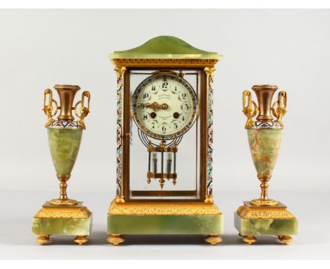 A VERY GOOD FRENCH ORMOLU AND CHAMPLEVE ENAMEL THREE PIECE CLOCK GARNITURE, the clock with white dial, painted with garlands,