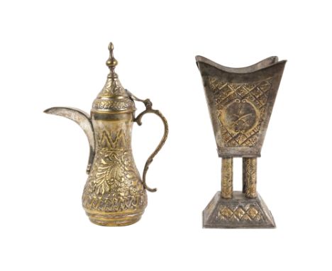 A SAUDI TINNED BRASS DALLAH COFFEE POT AND BAKHOOR INCENSE BURNERSaudi Arabia, post-1950
Comprising a traditional dallah coff