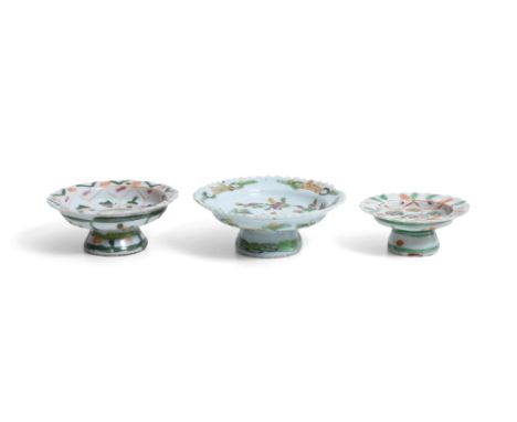 THREE CHINESE BENCHARONG STEM CUPSQing dynasty, 19th century
Produced for the Thai market, each with a flat cup and a lobed r