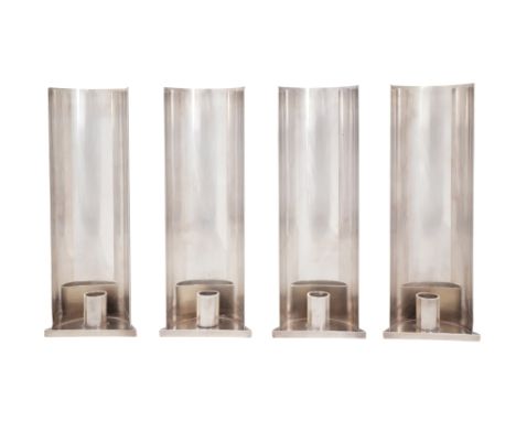 FOUR CHRISTIAN DIOR SILVER-PLATED DESIGN CANDLESTICKSFrance, ca. 1970s
Each candle holder with a triangular base and curved, 