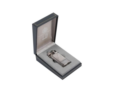Dunhill ‘Unique’ Silver-Plated Lighter with Box and PapersEngland, late 20th century
A vintage Alfred Dunhill ‘Unique’ petrol