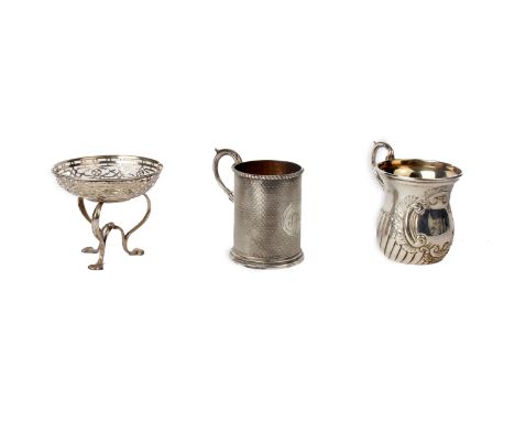 Two sterling silver christening mugs, one with raised decoration and the other with engine turned design together with a smal