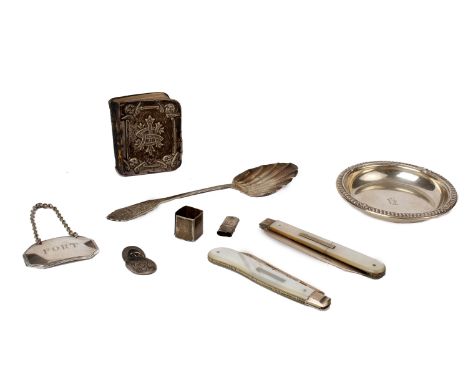 A collection of sterling silver and white metal items to include, pen knives, decanter label, dish and other items. 