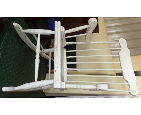 Painted stick back rocking chair 