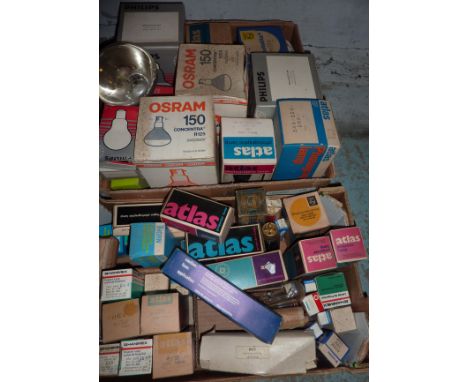 Two boxes of flood lamp bulbs and various projector lamps 