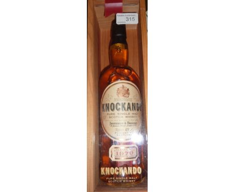 Bottle of Knockando Pure Single malt Scotch Whisky dated 1979 by Justerini & Brooks in display box 