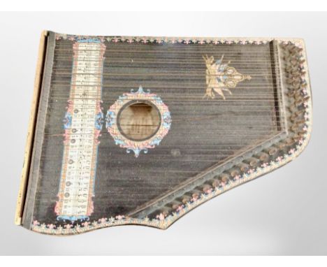 An antique guitar zither.