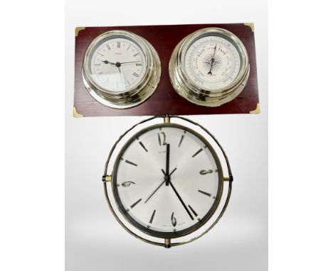 A Metamec quartz wall clock/barometer and a further Metamec clock. (2)