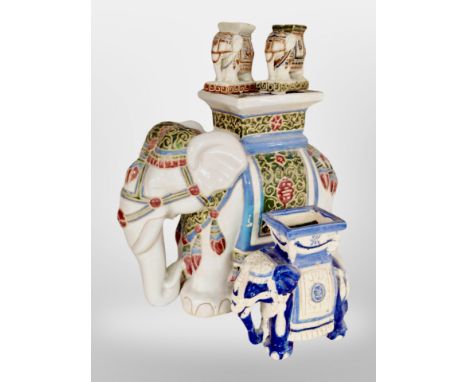 A ceramic elephant plant stand, a smaller example, and a further pair of bookends (4).