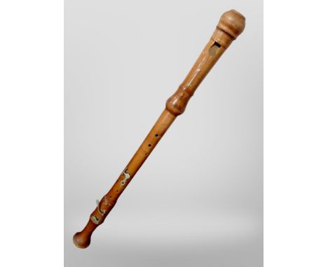 An oversized turned wooden recorder, length 94 cm