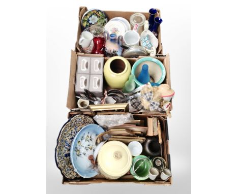 Three boxes containing various ceramic pots and plates, picture frames, cutlery, kitchenwares.