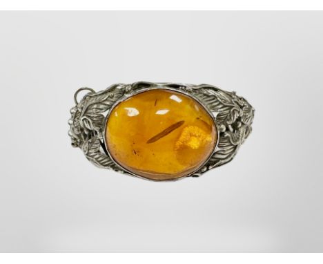 A silver amber cuff bangle