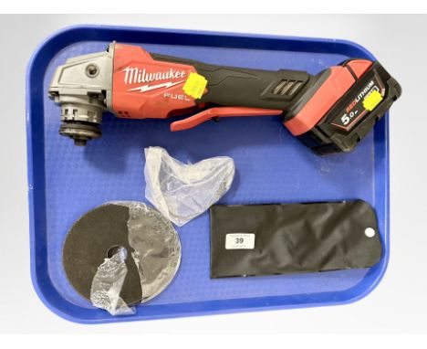 A Milwaukee Fuel 5.0 red lithium disc grinder with battery CONDITION REPORT: Currently working.
