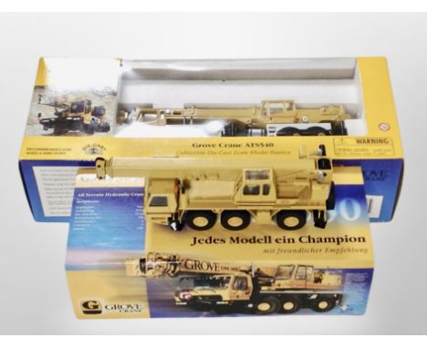 A Grove diecast crane ATS540 1:50 scale, together with a further GMK3050 crane, both boxed.