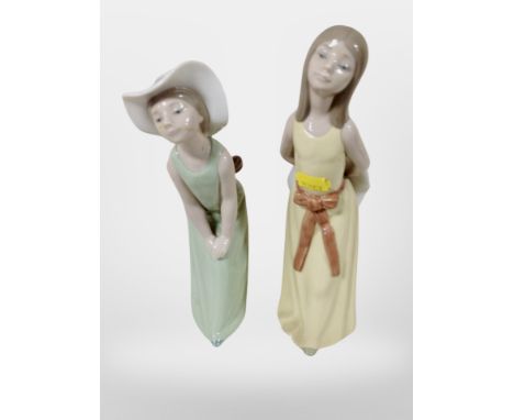 Two Lladro figures of girls.